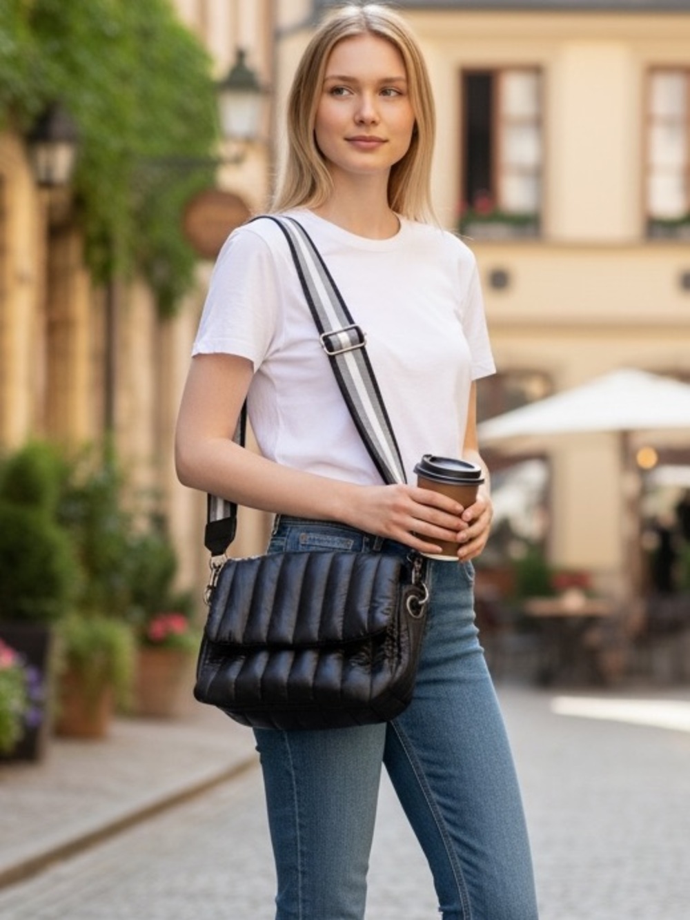 Think Royln Bar Bag. Adjustable Striped Strap defines this chic bag. Black
